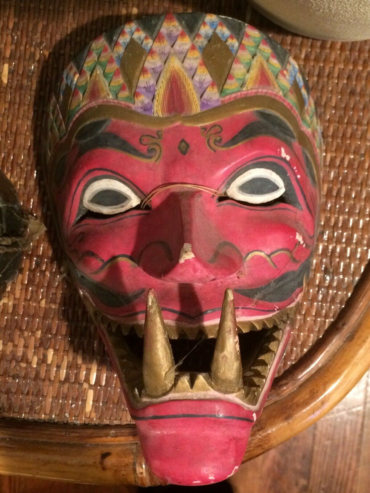 A Hand-painted And Hand-carved Indonesian Festival Face Mask